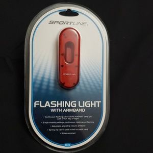Flashing light with arm band